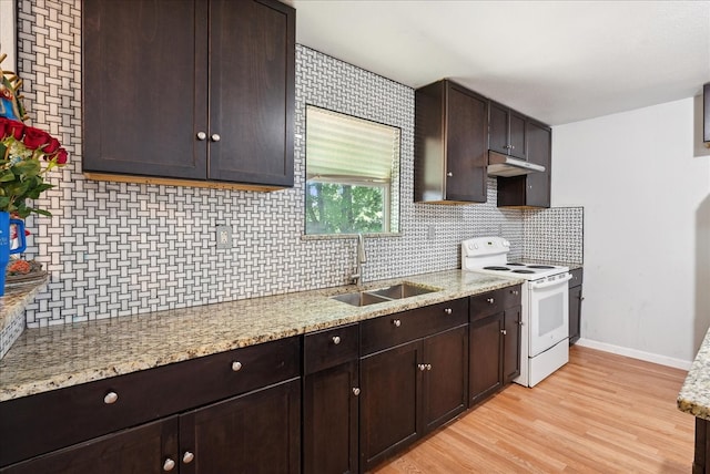 kitchen featuring tasteful backsplash, dark brown cabinets, white range with electric stovetop, sink, and light hardwood / wood-style flooring