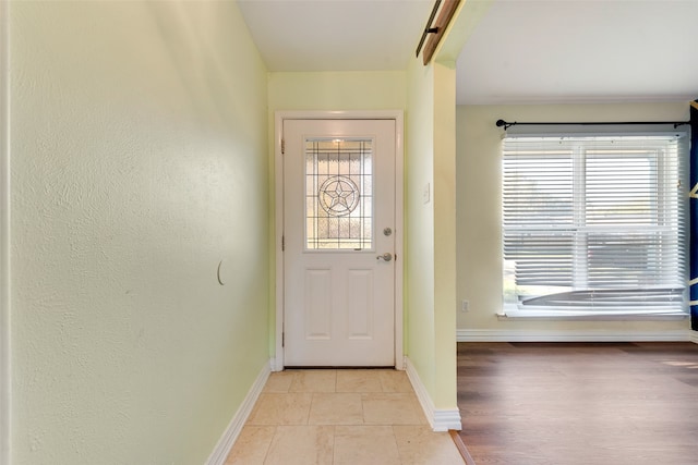 doorway to outside featuring light hardwood / wood-style floors