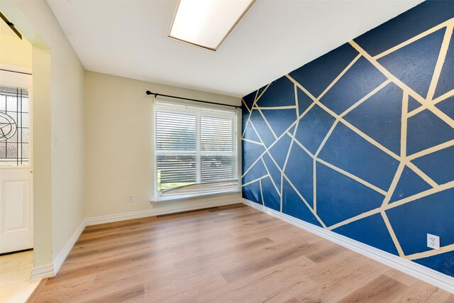 7421 Christopher Ct, North Richland Hills, TX 76180 - unfurnished room with wood finished floors and plenty of natural light