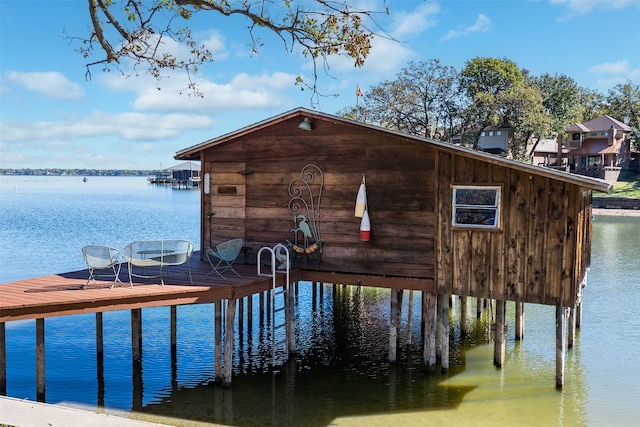 dock area with a water view