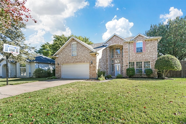 front of property with a garage and a front yard