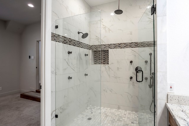 bathroom with vanity and walk in shower