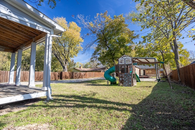 view of yard with a playground