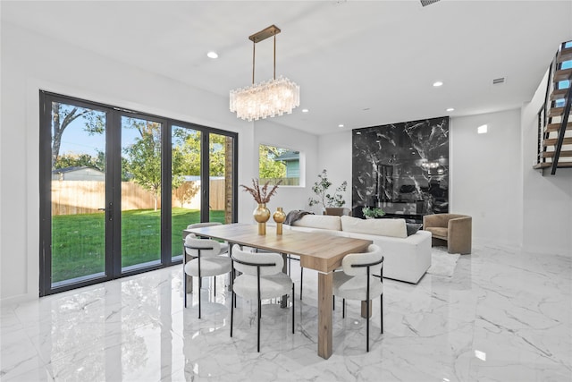 dining room with a notable chandelier