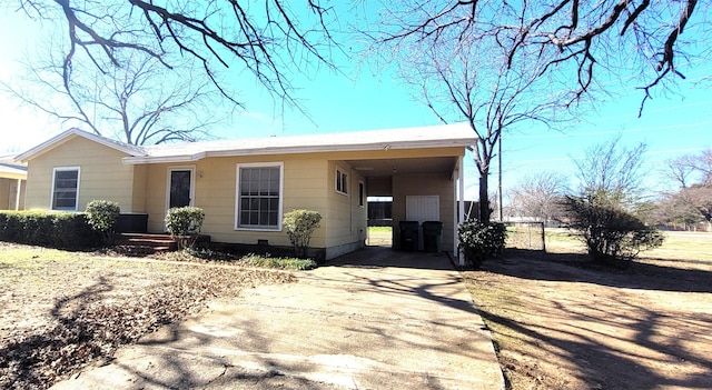 view of front facade with a carport