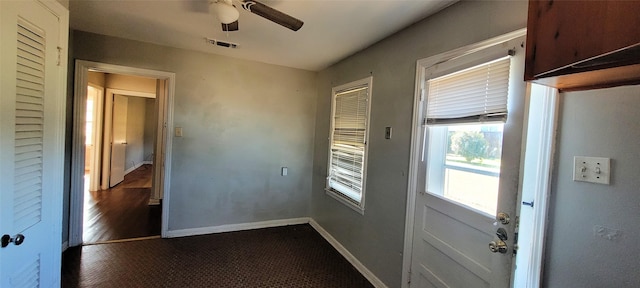 entryway featuring ceiling fan