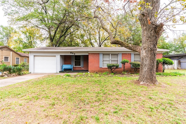 ranch-style home with a garage and a front yard