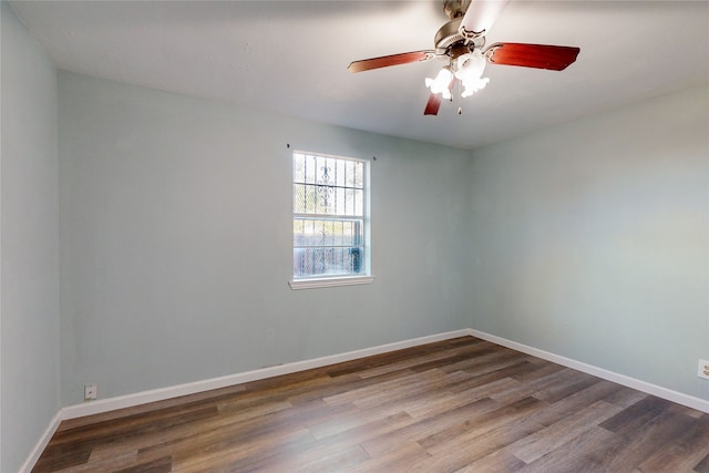 spare room featuring ceiling fan and wood-type flooring