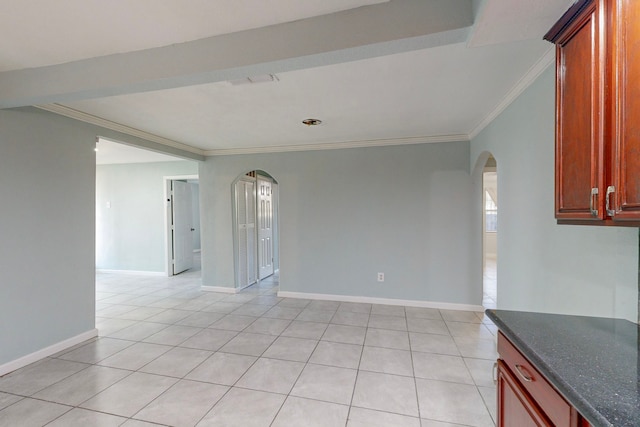 tiled empty room with ornamental molding