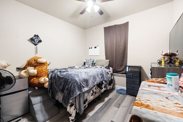 bedroom featuring ceiling fan and light wood-type flooring