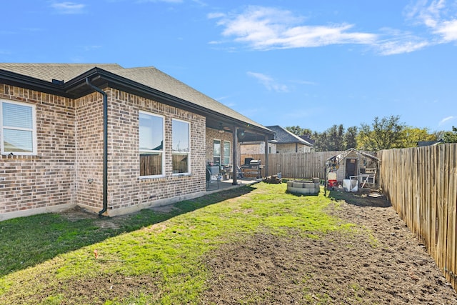 exterior space with a yard and a patio