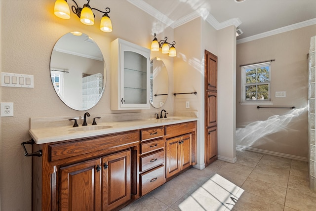 bathroom with tile patterned floors, vanity, and crown molding