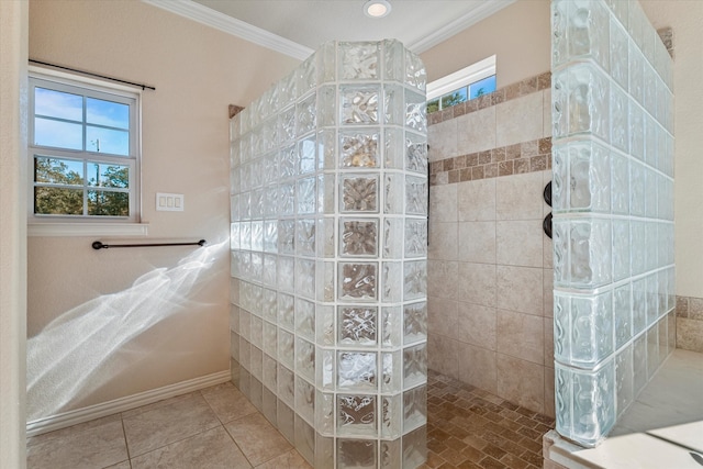 bathroom with crown molding, tile patterned flooring, and tiled shower