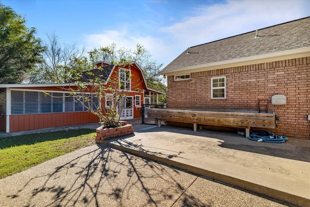 rear view of property with a patio