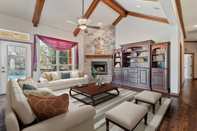 living room with beam ceiling, ceiling fan, dark hardwood / wood-style flooring, high vaulted ceiling, and a fireplace