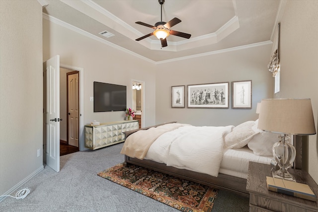 bedroom with carpet, ceiling fan, a raised ceiling, and crown molding