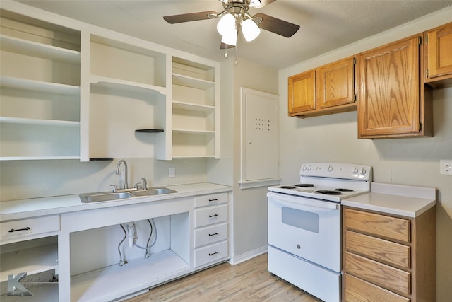 kitchen with sink, light hardwood / wood-style floors, ceiling fan, and white range with electric stovetop