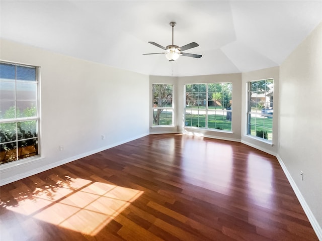 unfurnished room with dark hardwood / wood-style flooring, ceiling fan, and lofted ceiling