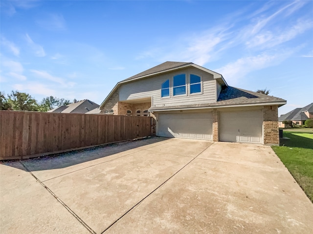 view of property exterior featuring a garage