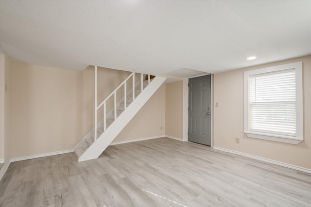 basement with light wood-type flooring