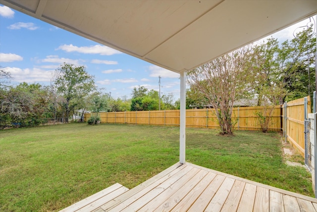 view of yard with a deck