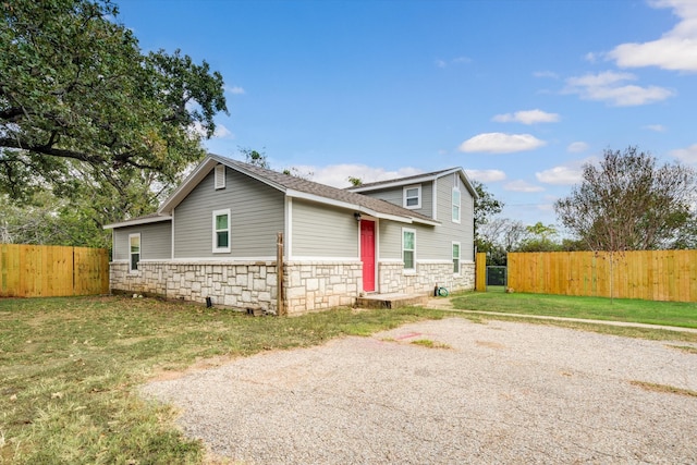 view of front of home with a front yard