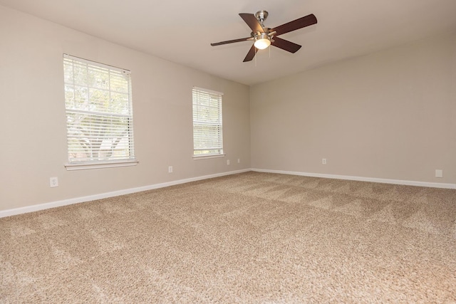 unfurnished room featuring carpet floors and ceiling fan