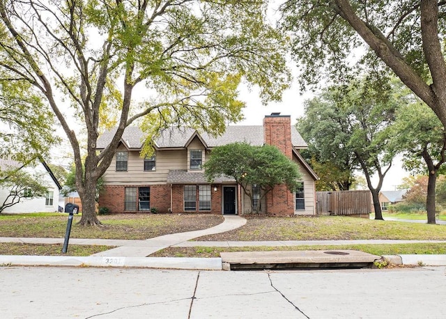 view of front facade featuring a front yard