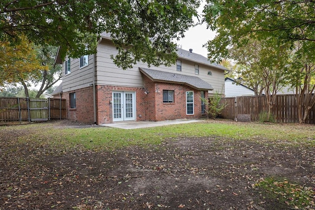 back of property with a patio area