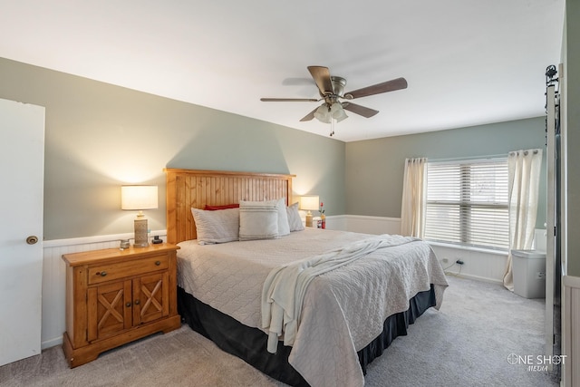 bedroom featuring ceiling fan and light colored carpet