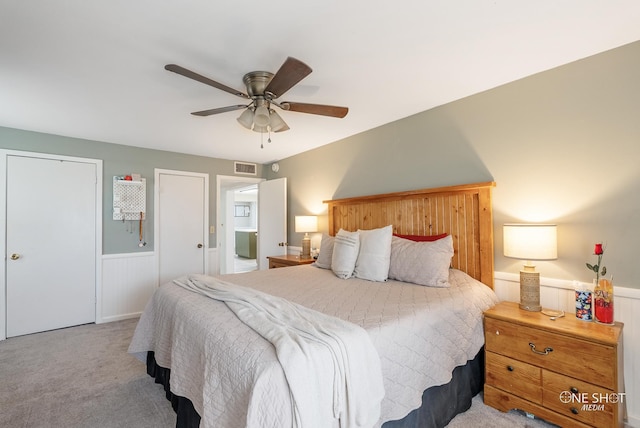 carpeted bedroom featuring ceiling fan