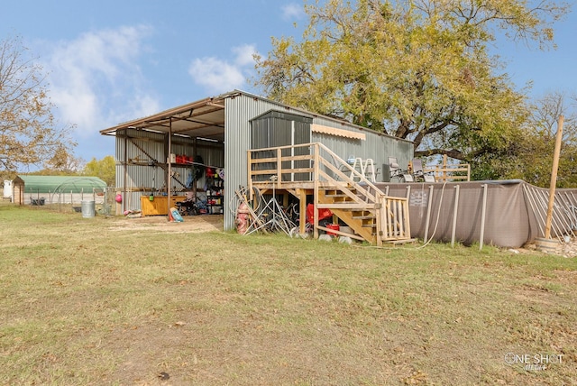 view of outdoor structure featuring a yard