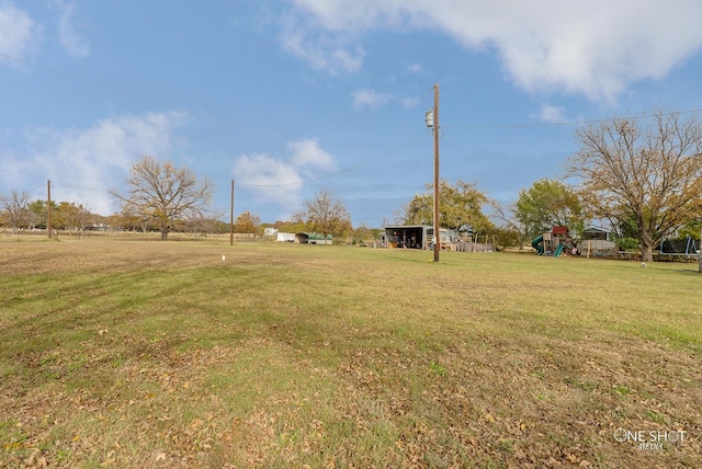 view of yard featuring a playground