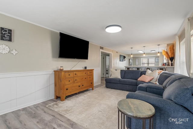 living room with light hardwood / wood-style floors