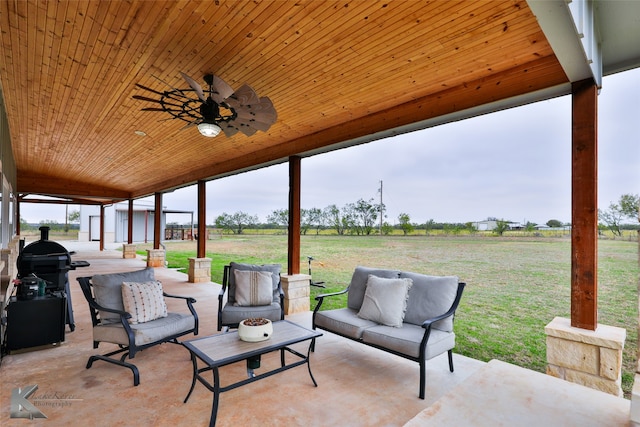 view of patio / terrace with ceiling fan, an outdoor hangout area, and grilling area