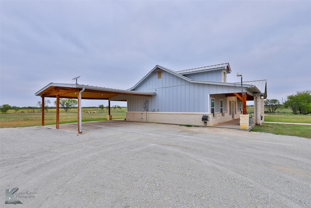 exterior space with a carport