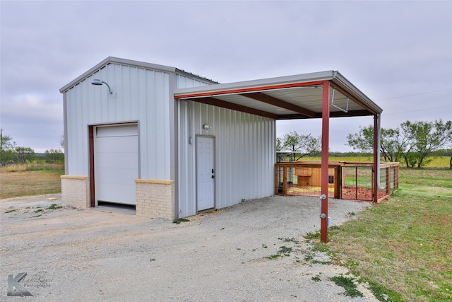 view of outdoor structure featuring a garage