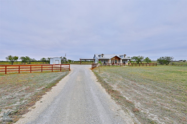 view of road featuring a rural view