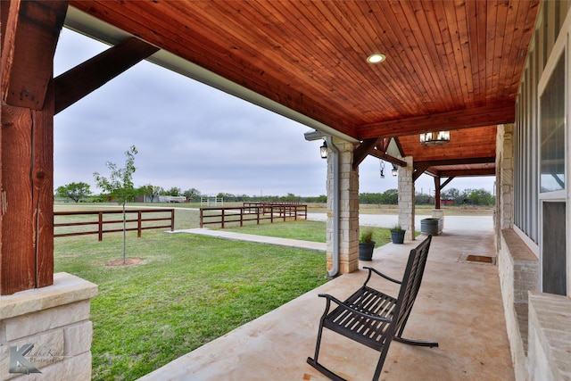 view of yard with a rural view