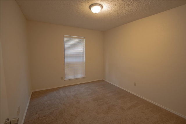 7208 Ridge Rd W, Fort Worth, TX 76133 - carpeted empty room with a textured ceiling and baseboards