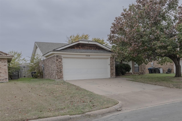 7208 Ridge Rd W, Fort Worth, TX 76133 - ranch-style home featuring an attached garage, brick siding, a front lawn, and driveway