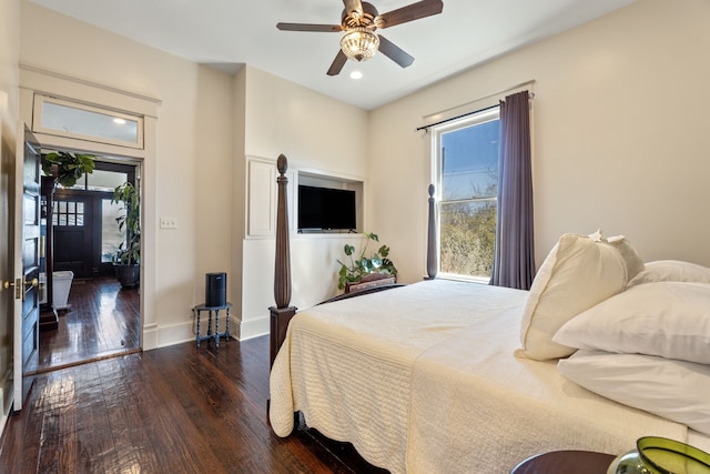 bedroom featuring recessed lighting, baseboards, ceiling fan, and hardwood / wood-style floors