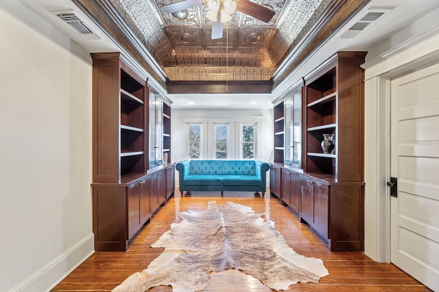 unfurnished room featuring an ornate ceiling, visible vents, baseboards, and ornamental molding