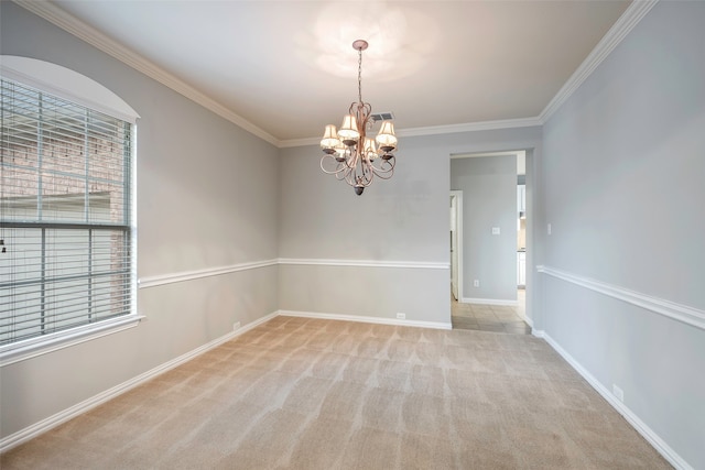 carpeted empty room with crown molding and a notable chandelier