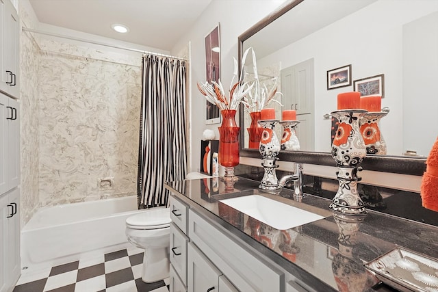 full bathroom with toilet, vanity, and shower / tub combo with curtain