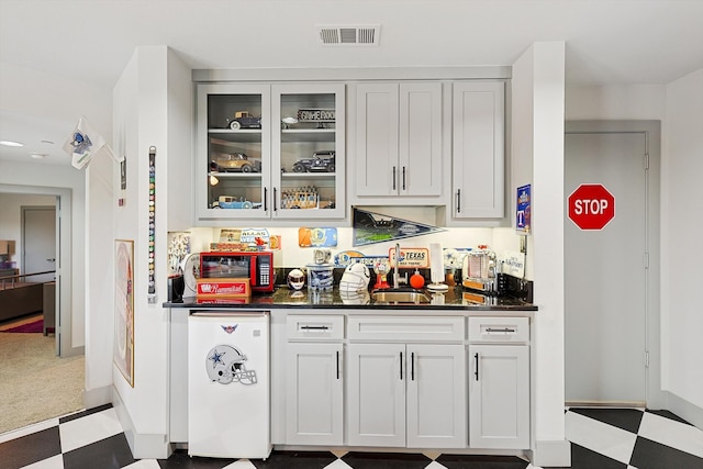 bar with white cabinets