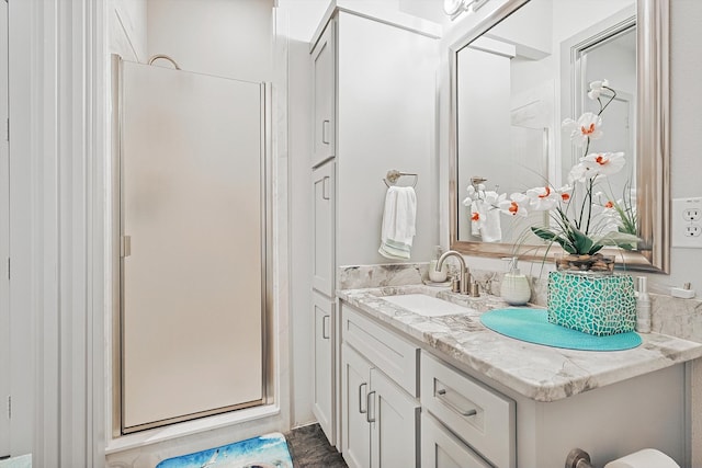 bathroom featuring vanity and walk in shower