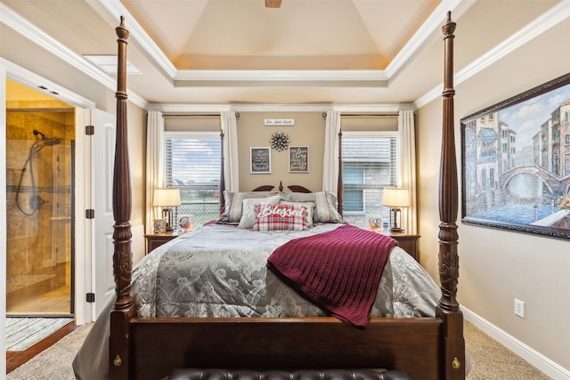 carpeted bedroom with a raised ceiling, multiple windows, and crown molding