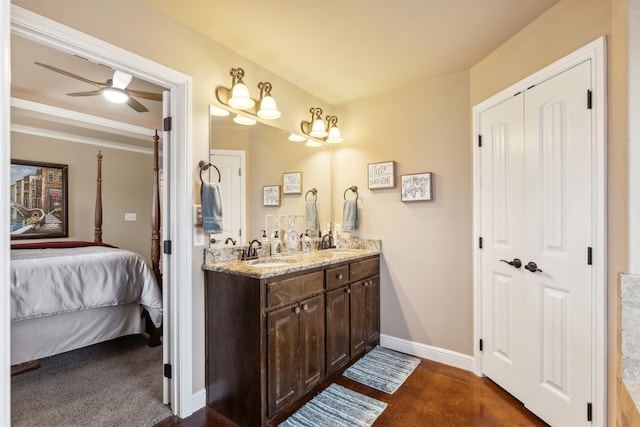 bathroom featuring ceiling fan and vanity