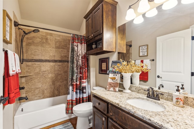 full bathroom with shower / tub combo, vanity, and toilet